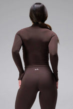 Back View of Brown TLF Tempo High Waisted Split Hem Leggings feature our Luxe DNA fabric with a side split hem for style versatility
