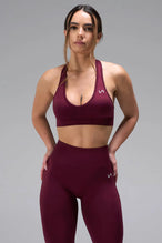 Front View of Dark Cherry TLF Cosmic Seamless Sports Bra features adjustable strap for custom fit with high support for performance and functionality