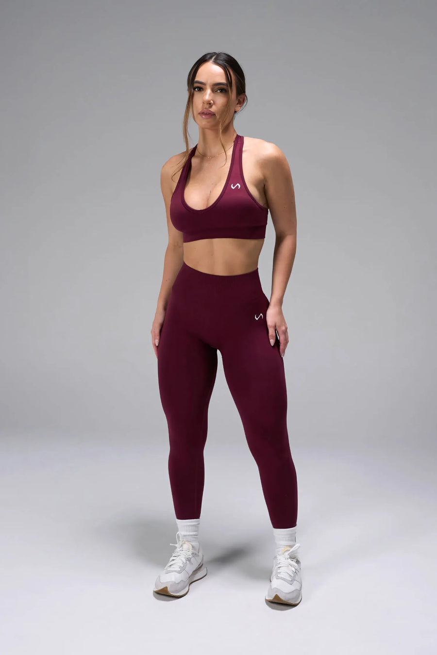 Front View of Dark Cherry TLF Cosmic Seamless Sports Bra features adjustable strap for custom fit with high support for performance and functionality