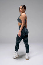 Side View of Green Tie Dye TLF Cosmic Seamless Sports Bra features adjustable strap for custom fit with high support for performance and functionality