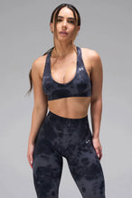 Front View of Blue Tie Dye TLF Cosmic Seamless Sports Bra features adjustable strap for custom fit with high support for performance and functionality