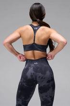 Back View of Blue Tie Dye TLF Cosmic Seamless Sports Bra features adjustable strap for custom fit with high support for performance and functionality