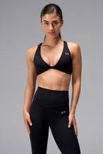 Black Tempo Front Clasp Sports Bra with Luxe DNA™ fabric and medium support for workouts and training by TLF Apparel – front view