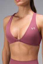 Pink Tempo Front Clasp Sports Bra showing front clasp closure and Luxe DNA™ fabric detail by TLF Apparel – detail view