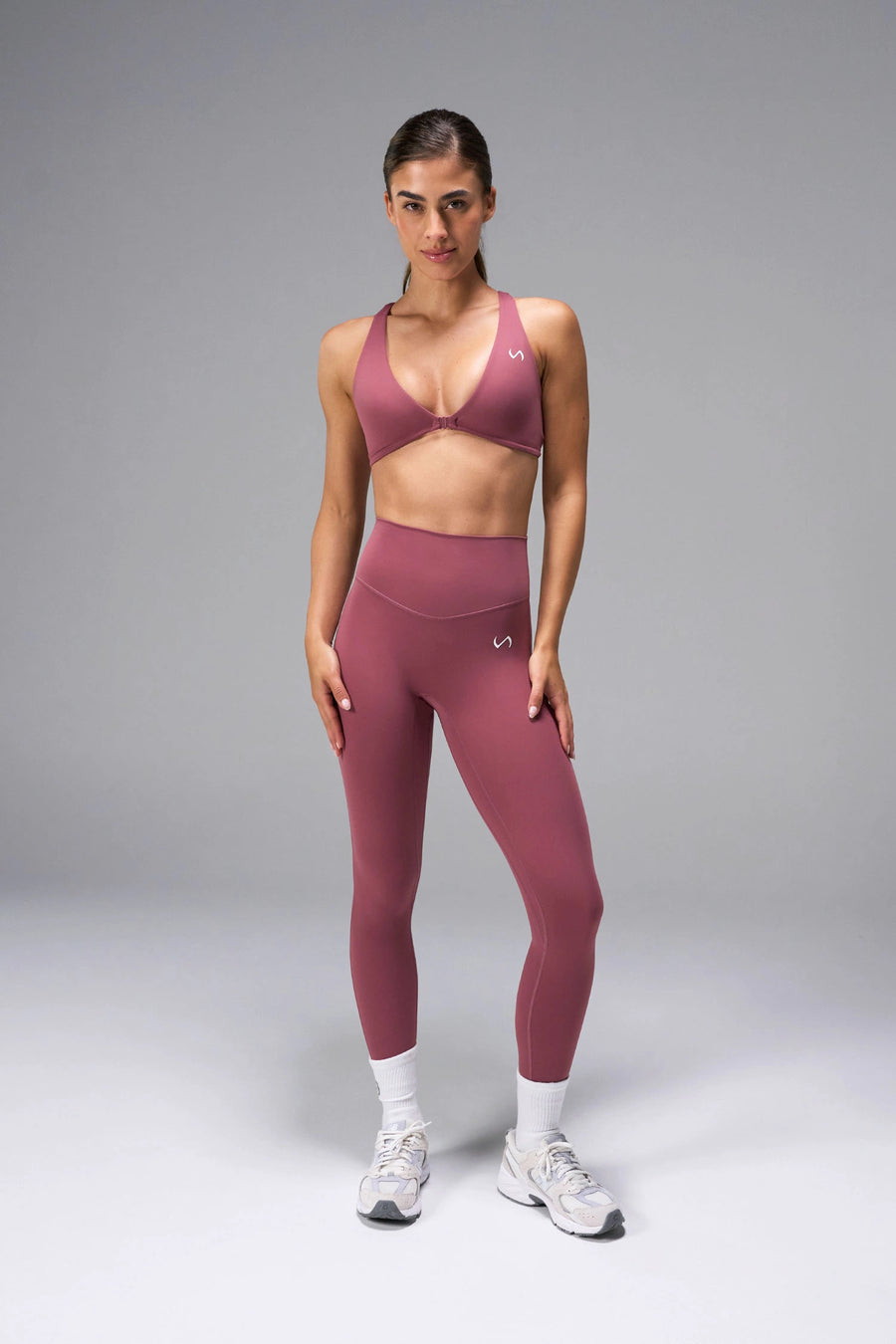 Pink Tempo Front Clasp Sports Bra with Luxe DNA™ fabric and medium support for workouts and training by TLF Apparel – front view