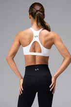 White Tempo Front Clasp Sports Bra with supportive racerback design and medium support for training by TLF Apparel – back view