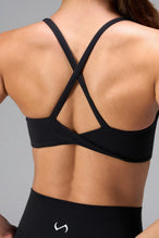 Black NeoCloud™ V-Neck Sports Bra with v neckline and medium support for the studio classes, pilates and gym training by TLF Apparel – back view 