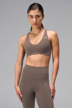Brown NeoCloud™ V-Neck Sports Bra with v neckline and medium support for the studio classes, pilates and gym training by TLF Apparel – front view 
