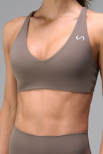 Brown NeoCloud™ V-Neck Sports Bra with v neckline and medium support for the studio classes, pilates and gym training by TLF Apparel – front view 