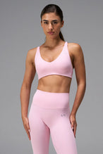 Pink NeoCloud™ V-Neck Sports Bra with v neckline and medium support for the studio classes, pilates and gym training by TLF Apparel – front view 