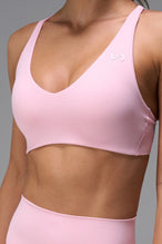 Pink NeoCloud™ V-Neck Sports Bra with strappy back design and medium support for studio, gym and daily wear by TLF Apparel – detail view 