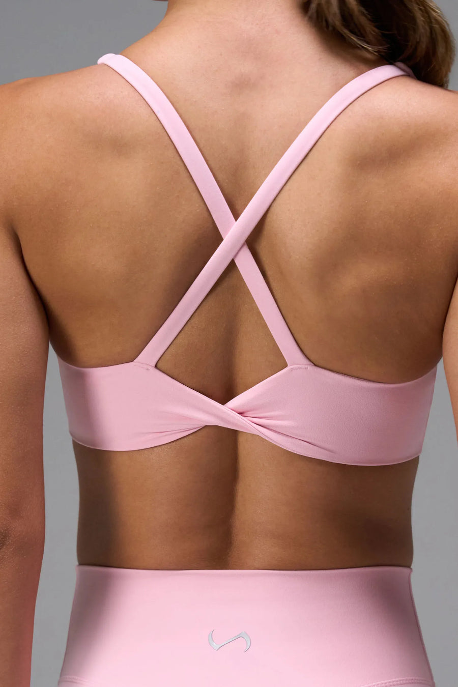 Pink NeoCloud™ V-Neck Sports Bra with strappy back design and medium support for studio, gym and daily wear by TLF Apparel – back view 