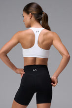 White Tempo Racerback Sports Bra showing supportive fit and racer back straps by TLF Apparel –  back view