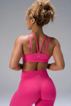 Pink NeoCloud™ Strappy Sports Bra showing strappy back design and breathable cloud-soft fabric by TLF Apparel – back view