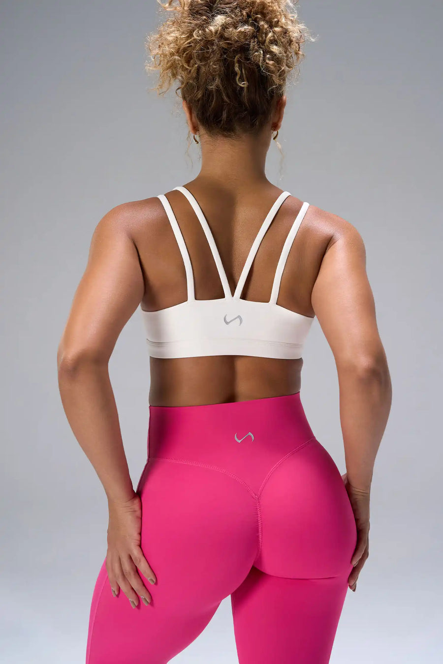 Cream NeoCloud™ Strappy Sports Bra showing strappy back design and breathable cloud-soft fabric by TLF Apparel – back view