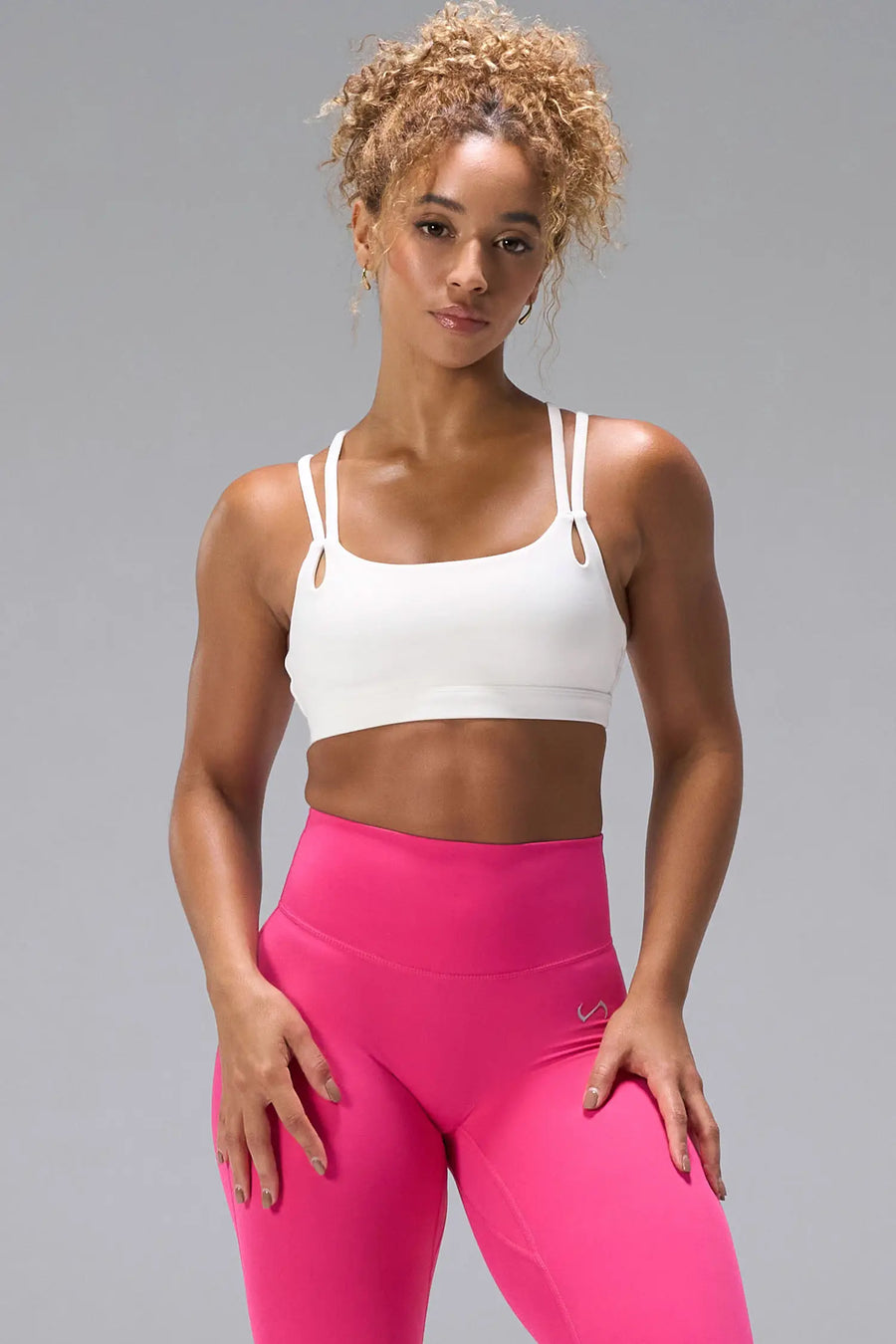 Cream NeoCloud™ Strappy Sports Bra with strappy back and removable pads for everyday wear by TLF Apparel – front view