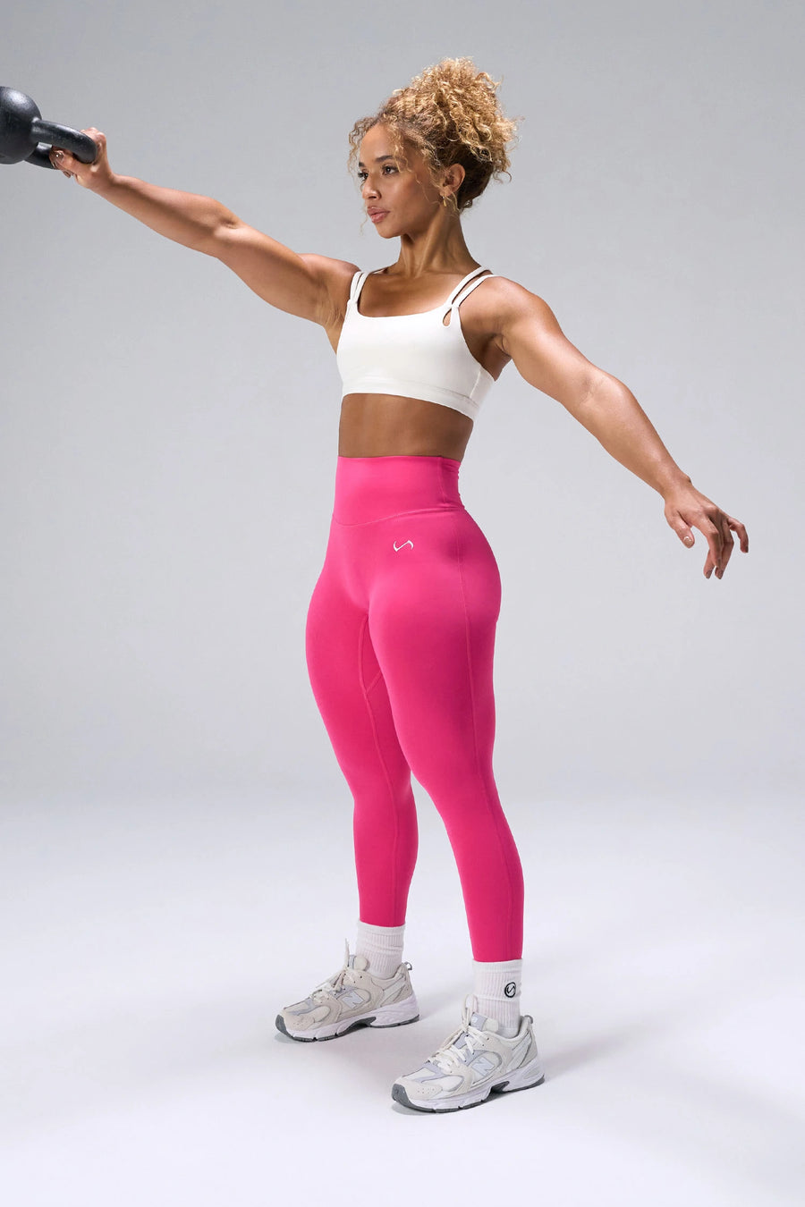 Cream NeoCloud™ Strappy Sports Bra with strappy back and medium support for gym training by TLF Apparel – front view