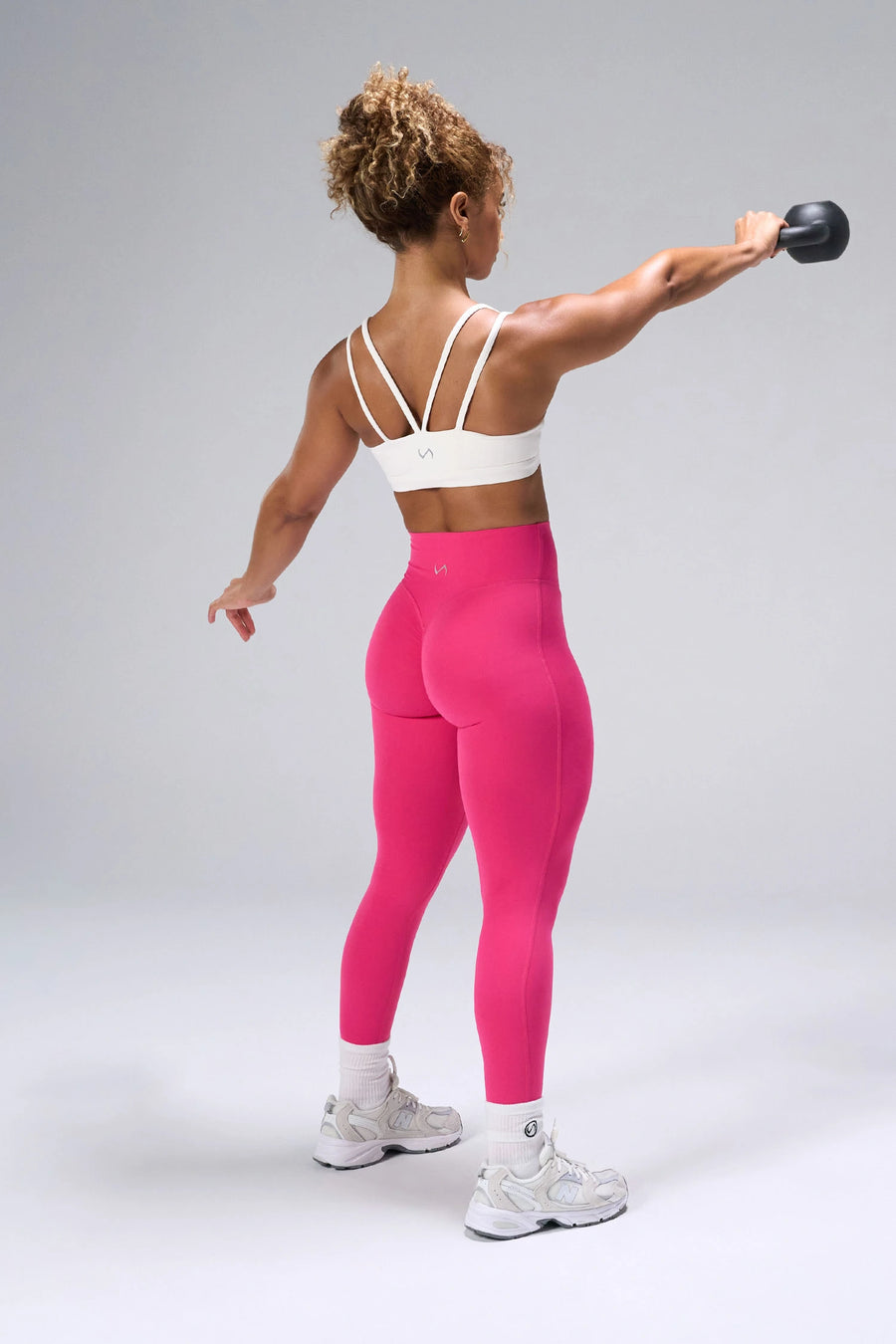 Cream NeoCloud™ Strappy Sports Bra showing strappy back design and breathable cloud-soft fabric by TLF Apparel – back view