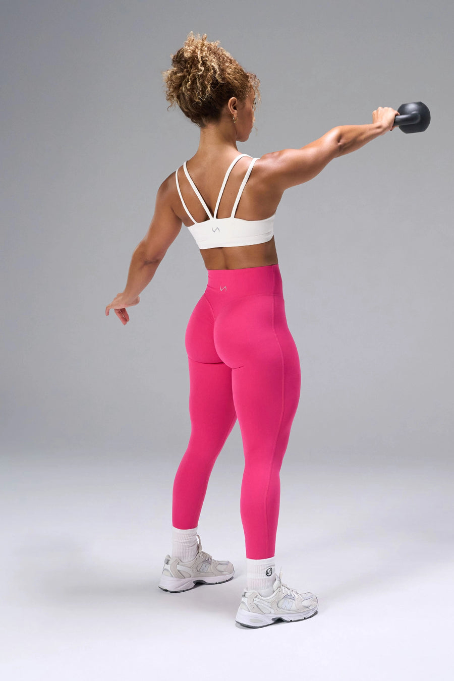 Cream NeoCloud™ Strappy Sports Bra showing strappy back design and breathable cloud-soft fabric by TLF Apparel – back view