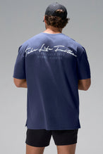 Navy Further Dura Cotton Short Sleeve Tee showing arched Take Life Further graphic and oversized fit by TLF Apparel – back view