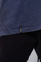 Navy Further Dura Cotton Short Sleeve Tee showing stone wash finish, woven hem clip label, and Dura Cotton DNA fabric by TLF Apparel – detail view 