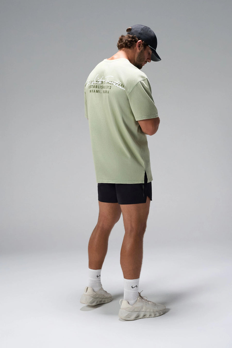 Green Further Dura Cotton Short Sleeve Tee showing oversized drape and gym-to-street fit by TLF Apparel – side view