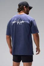 Navy RI Oversized Dura Cotton Short Sleeve Tee showing Redefine Impossible back graphic and oversized fit by TLF Apparel – back view 