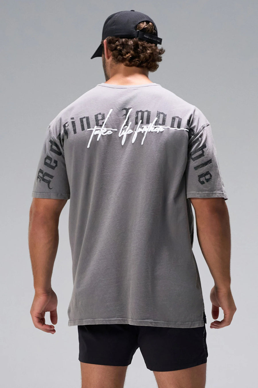 Gray RI Oversized Dura Cotton Short Sleeve Tee showing Redefine Impossible back graphic and oversized fit by TLF Apparel – back view 