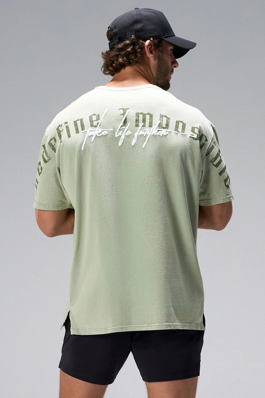 Green RI Oversized Dura Cotton Short Sleeve Tee showing Redefine Impossible back graphic and oversized fit by TLF Apparel – back view 