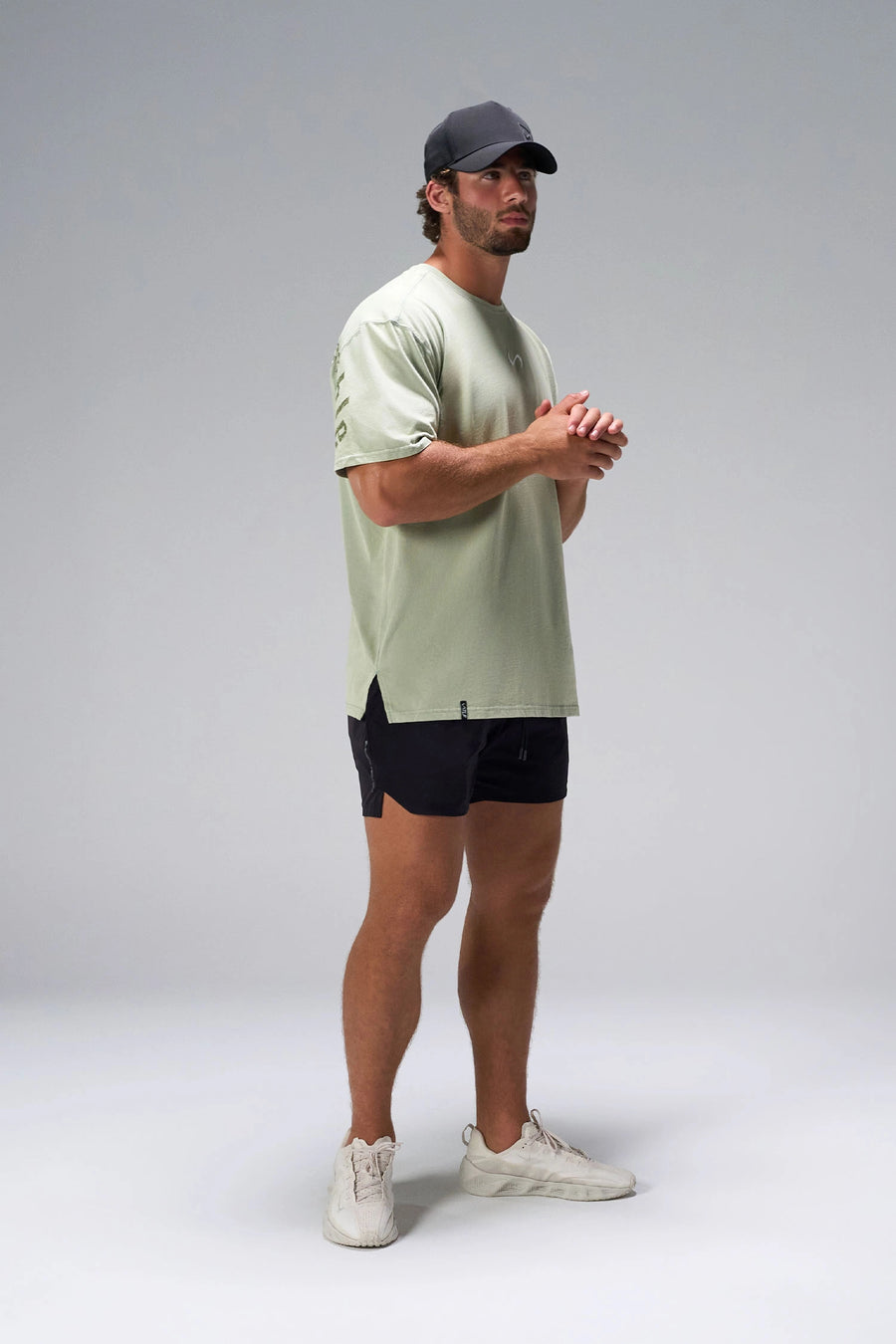 Green RI Oversized Dura Cotton Short Sleeve Tee showing oversized drape and gym-to-street fit by TLF Apparel – side view 