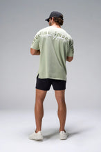 Green RI Oversized Dura Cotton Short Sleeve Tee showing relaxed oversized fit in 100% Dura Cotton by TLF Apparel – back view 