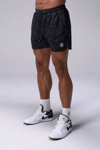 Black Splatter Print Reps Mesh 5 Inch Fitted Shorts with lightweight breathable mesh fabric, zip pockets, and 4-way stretch performance for gym training and workouts by TLF Apparel – front view