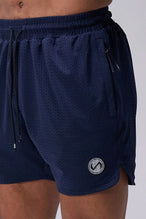 Navy Reps Mesh 5 Inch Fitted Shorts showing athletic side silhouette, side split hems, and zip pocket storage by TLF Apparel – side view