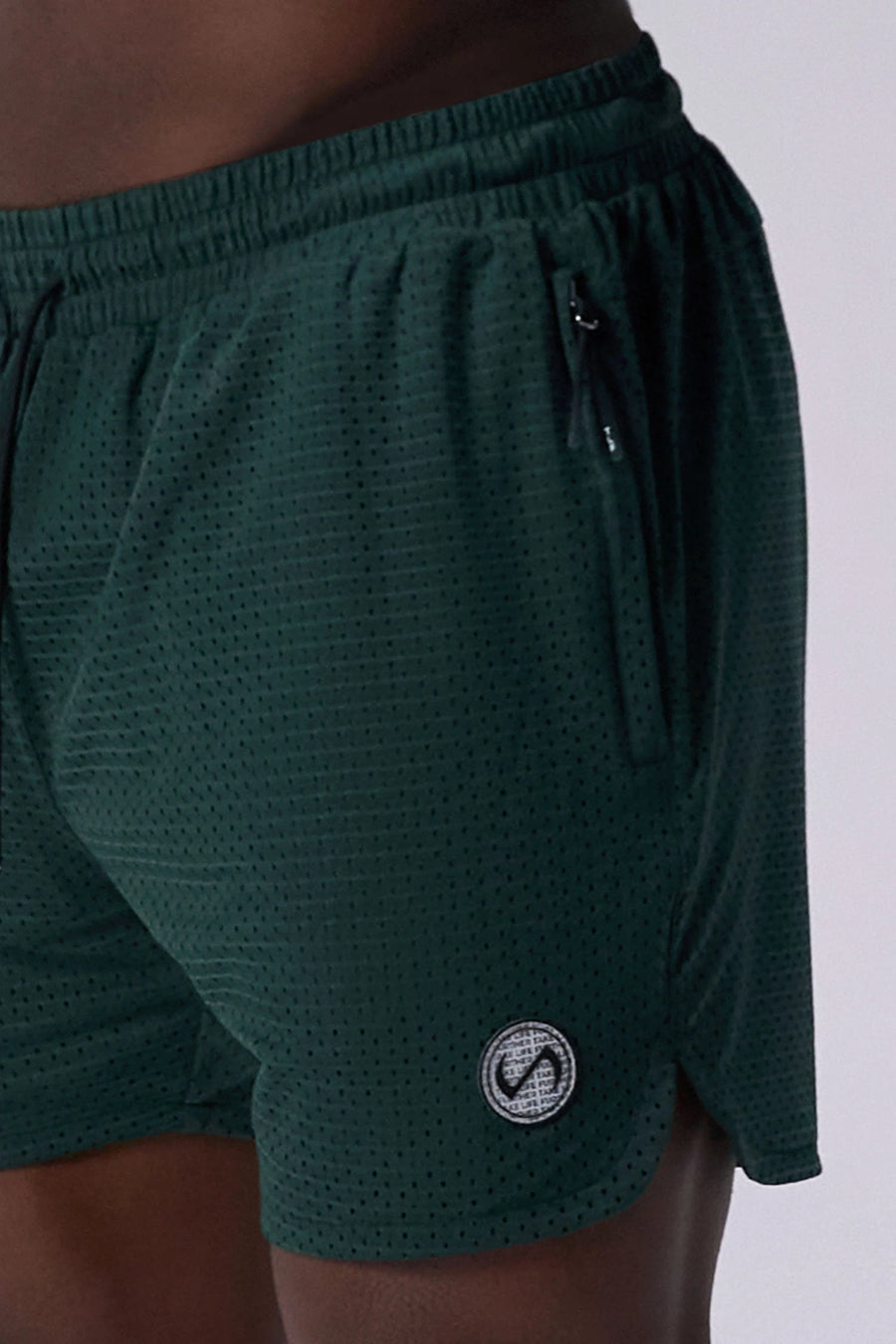 Green Reps Mesh 5 Inch Fitted Shorts showing athletic side silhouette, side split hems, and zip pocket storage by TLF Apparel – side view