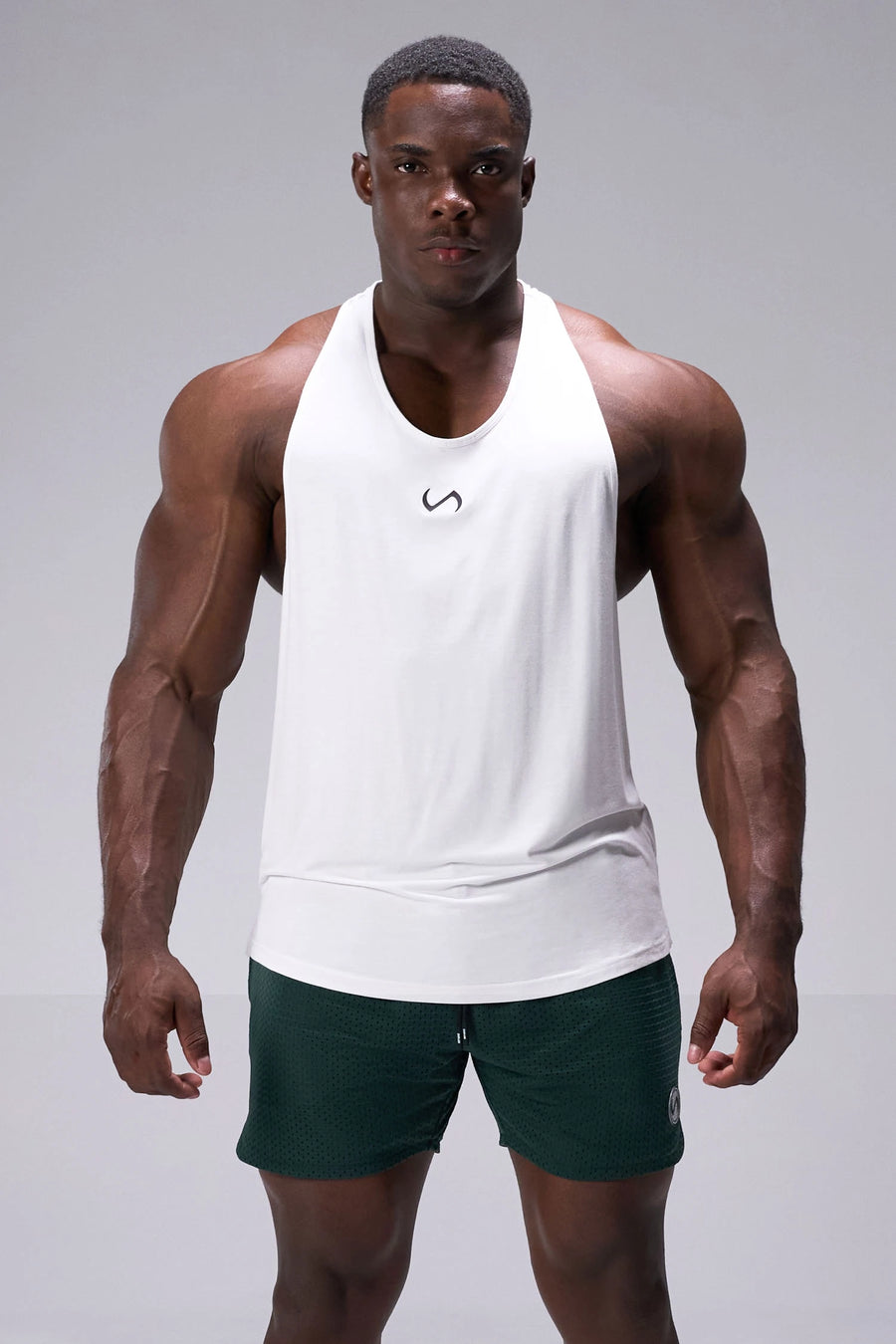 Green Reps Mesh 5 Inch Fitted Shorts with fitted athletic silhouette, zip pockets, and lightweight mesh fabric for training by TLF Apparel – front view