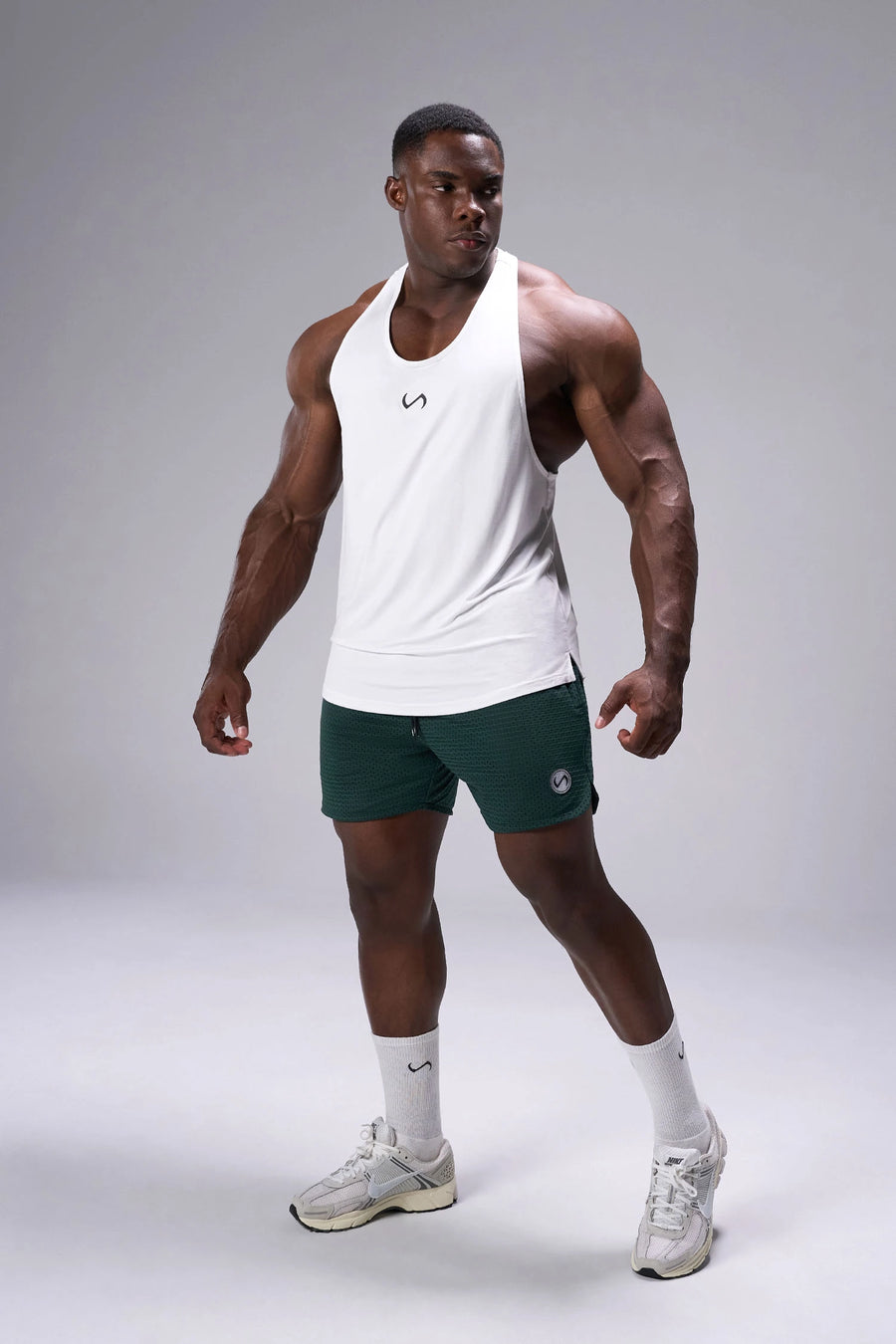 Green Reps Mesh 5 Inch Fitted Shorts showing 5 inch inseam fit, fitted athletic silhouette, and unrestricted mobility by TLF Apparel – side view
