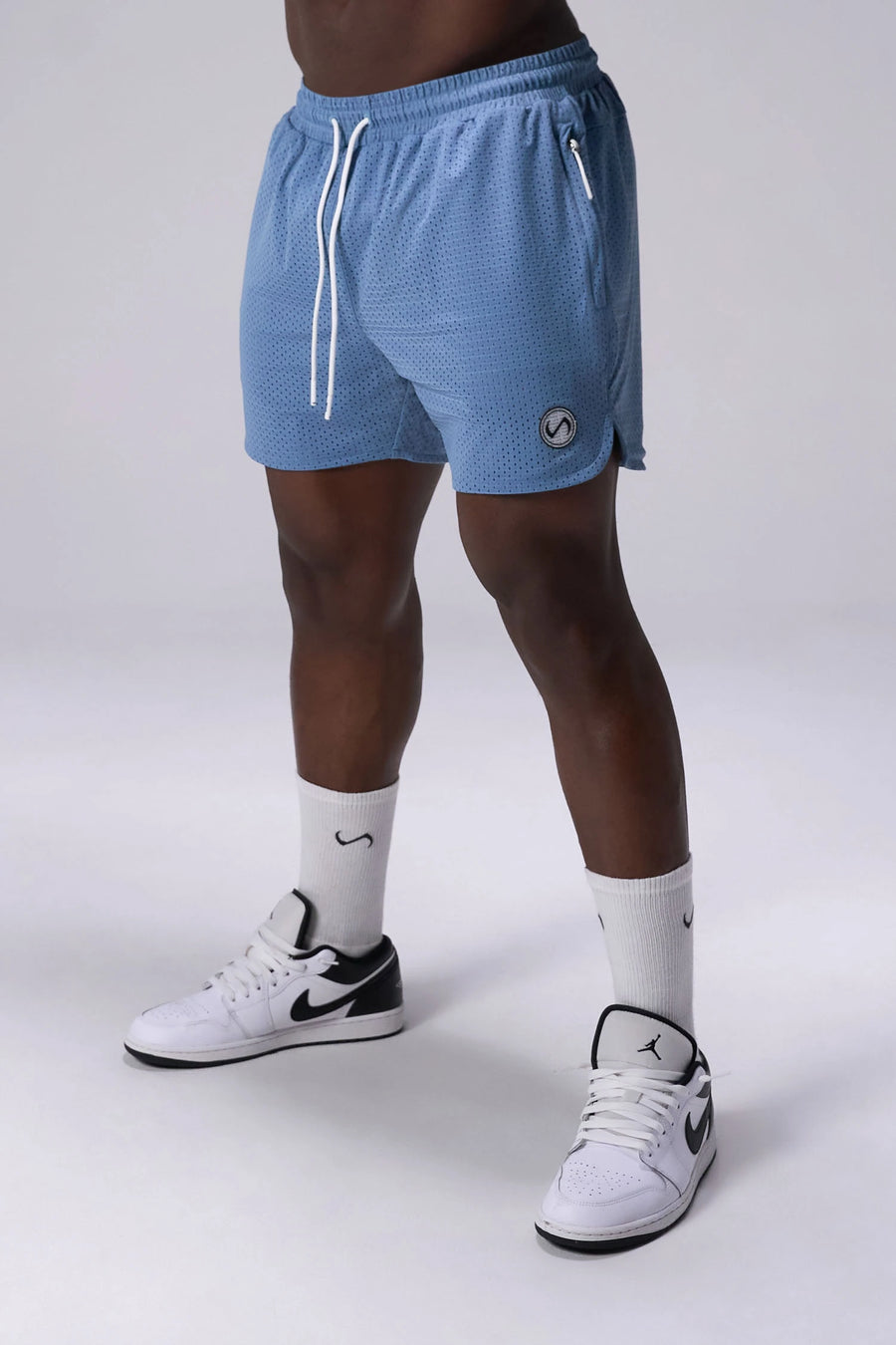 Light Blue Reps Mesh 5 Inch Fitted Shorts with lightweight breathable mesh fabric, zip pockets, and 4-way stretch performance for gym training and workouts by TLF Apparel – front view