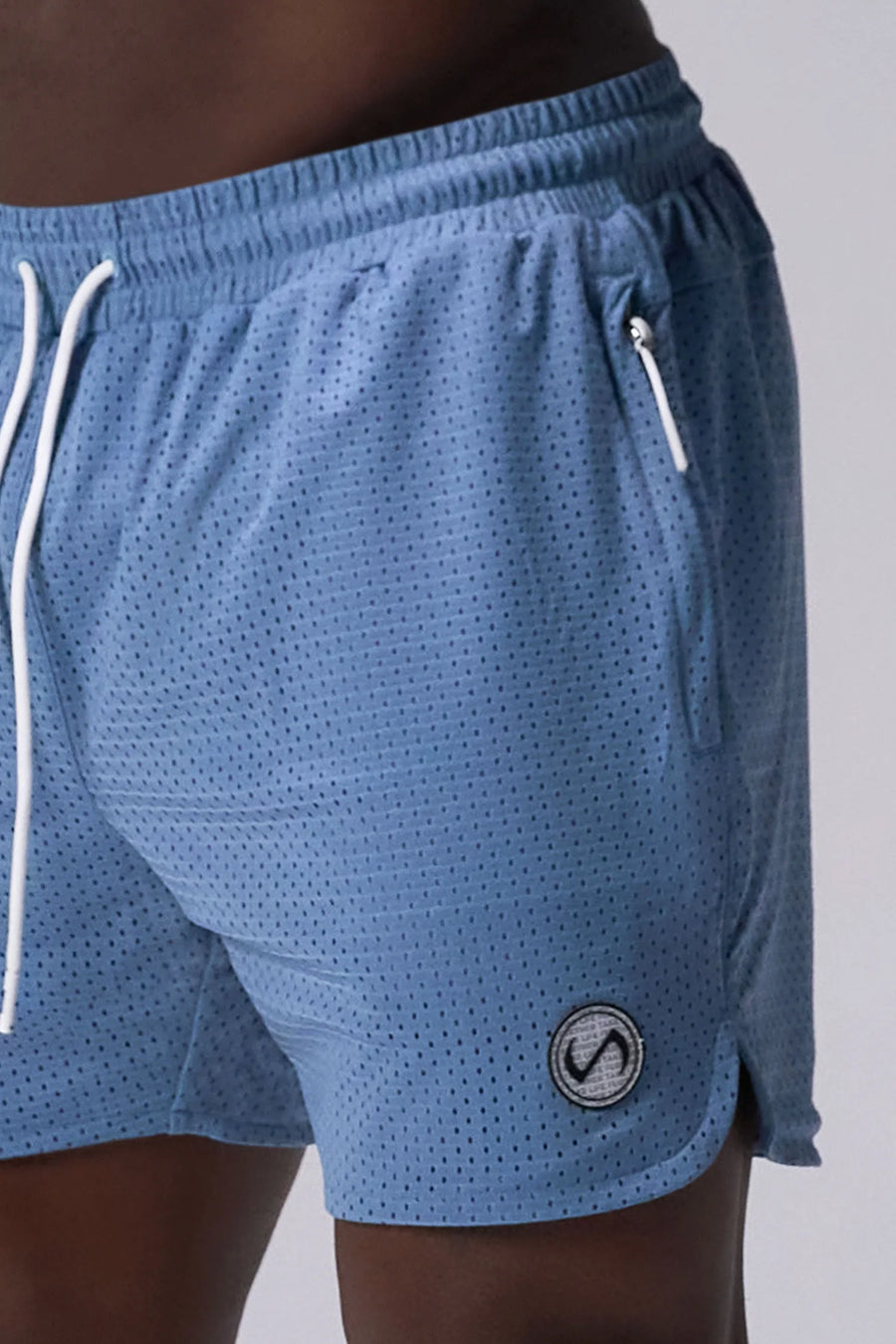 Light Blue Reps Mesh 5 Inch Fitted Shorts showing athletic side silhouette, side split hems, and zip pocket storage by TLF Apparel – side view