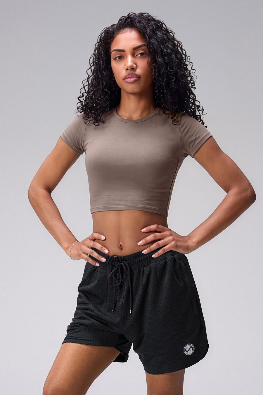 Black Splatter Print Reps Mesh 5 Inch Shorts with athletic silhouette, zip pockets, and lightweight mesh fabric for training by TLF Apparel – front view