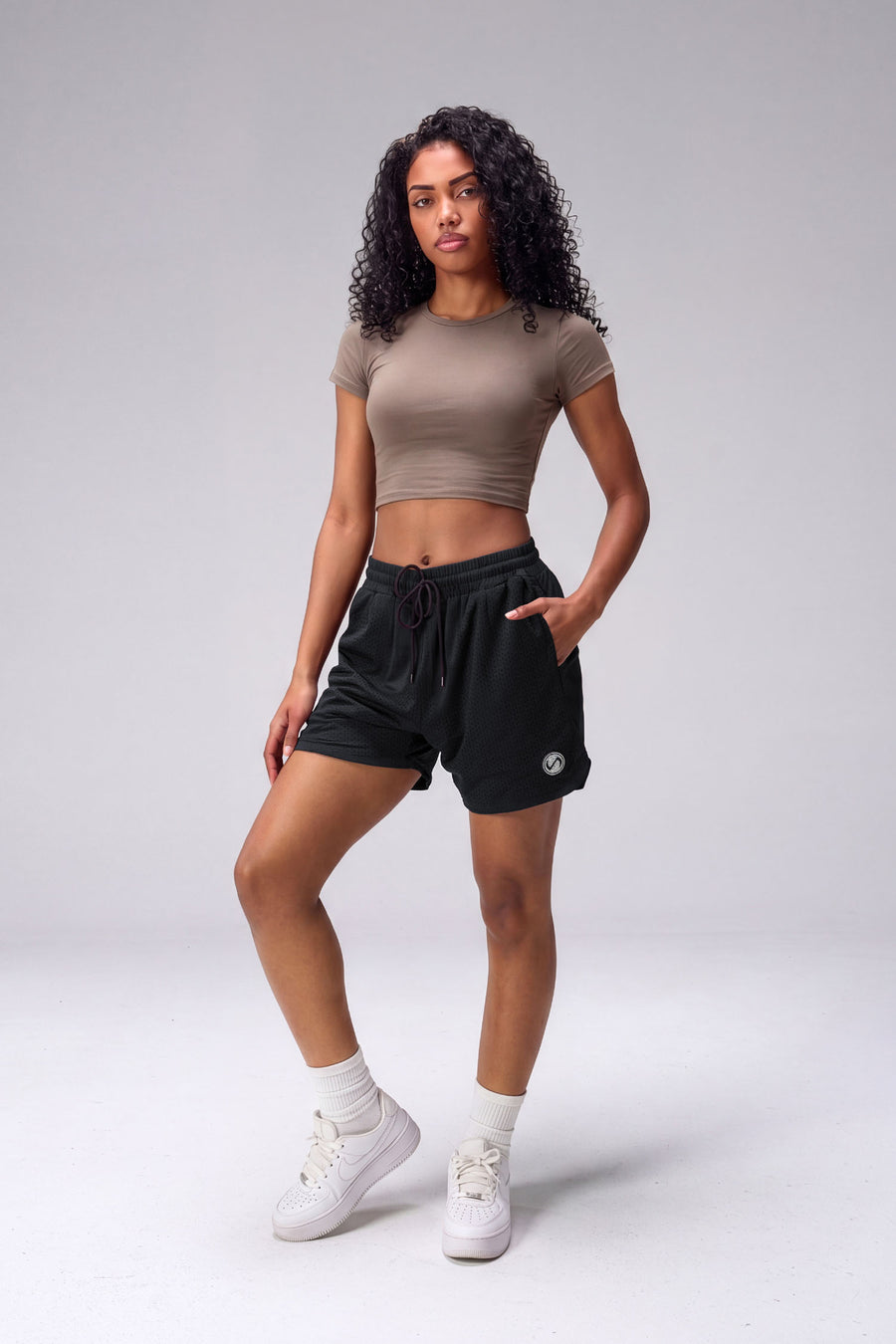 Black Reps Mesh 5 Inch Shorts with lightweight breathable mesh fabric, zip pockets, and 4-way stretch performance for gym training and workouts by TLF Apparel – front view