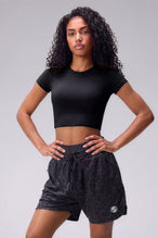 Black Splatter Print Reps Mesh 5 Inch Shorts with athletic silhouette, zip pockets, and lightweight mesh fabric for training by TLF Apparel – front view