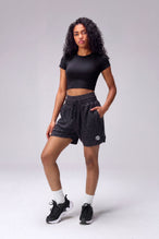 Black Splatter Print Reps Mesh 5 Inch Fitted Shorts with lightweight breathable mesh fabric, zip pockets, and 4-way stretch performance for gym training and workouts by TLF Apparel – front view