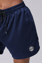 Navy Reps Mesh 5 Inch Shorts showing Mesh Tech DNA™ fabric, side split hem construction, and premium details by TLF Apparel – detail view