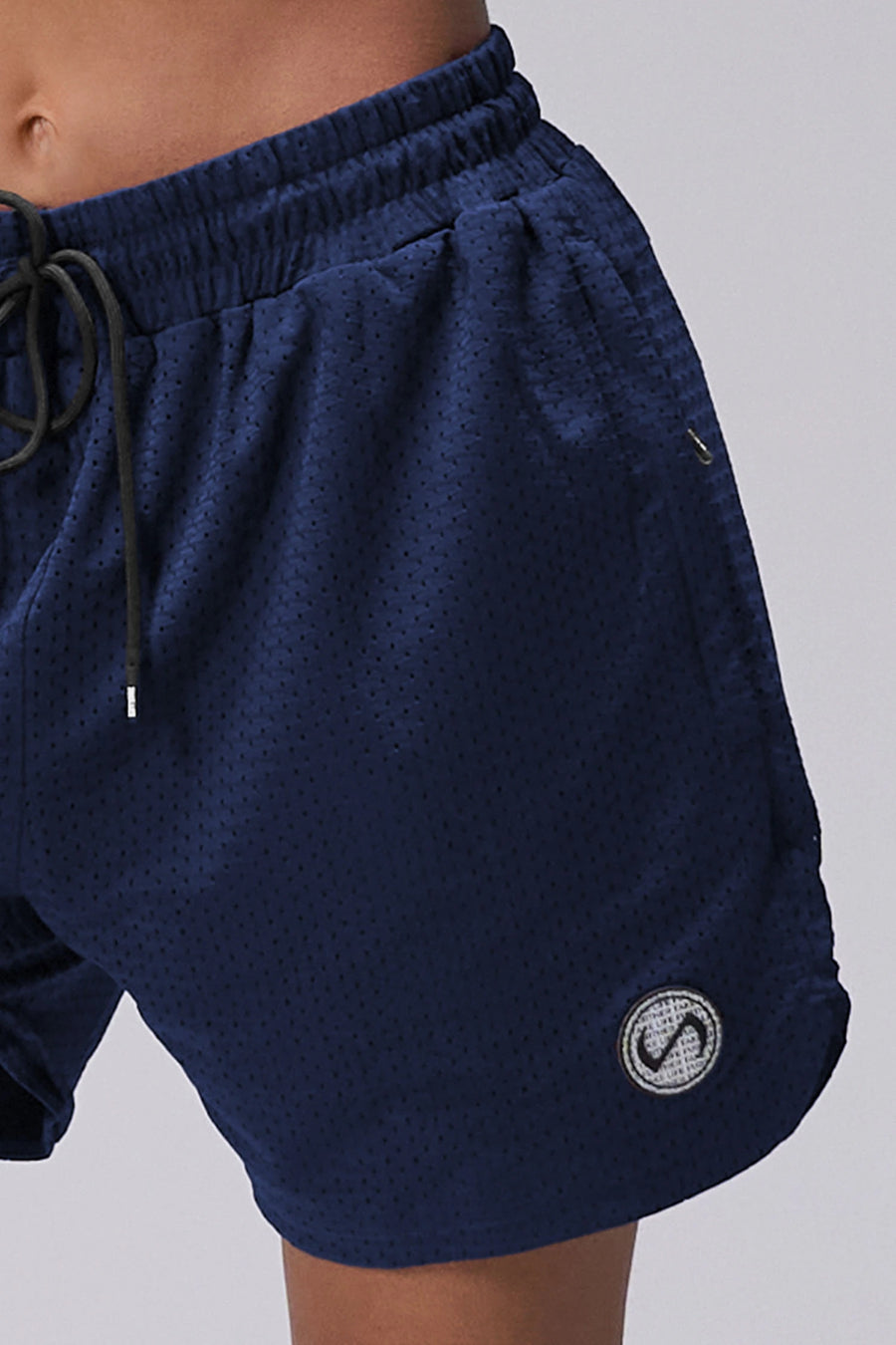 Navy Reps Mesh 5 Inch Shorts showing Mesh Tech DNA™ fabric, side split hem construction, and premium details by TLF Apparel – detail view