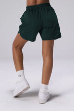 Green Reps Mesh 5 Inch Shorts showing fitted athletic silhouette and breathable mesh performance fabric by TLF Apparel – back view