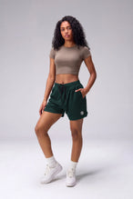 Green Reps Mesh 5 Inch Shorts with lightweight breathable mesh fabric, zip pockets, and 4-way stretch performance for gym training and workouts by TLF Apparel – front view