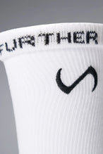 White Unisex Performance Crew Socks with medium cushioning, targeted compression, and jacquard foot mapping for support and comfort by TLF Apparel – side view 