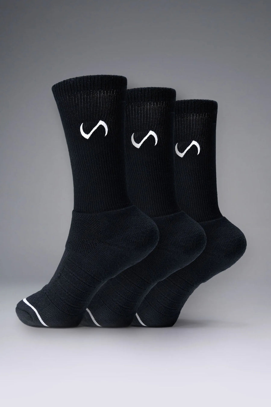 3 Pack Black Unisex Performance Crew Socks with medium cushioning, targeted compression, and jacquard foot mapping for support and comfort by TLF Apparel – side view 