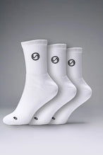 3 Pack Of White TLF Evolve Half Crew Socks featuring an extended cuff height, ribbed cuff, cushioned footbed and seamless toe