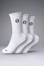 3 Pack Of White TLF Evolve Crew Socks featuring an extended cuff height, ribbed cuff, cushioned footbed and seamless toe